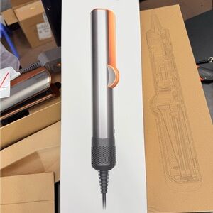 Dyson Hair Styling Tool in Silver and Orange